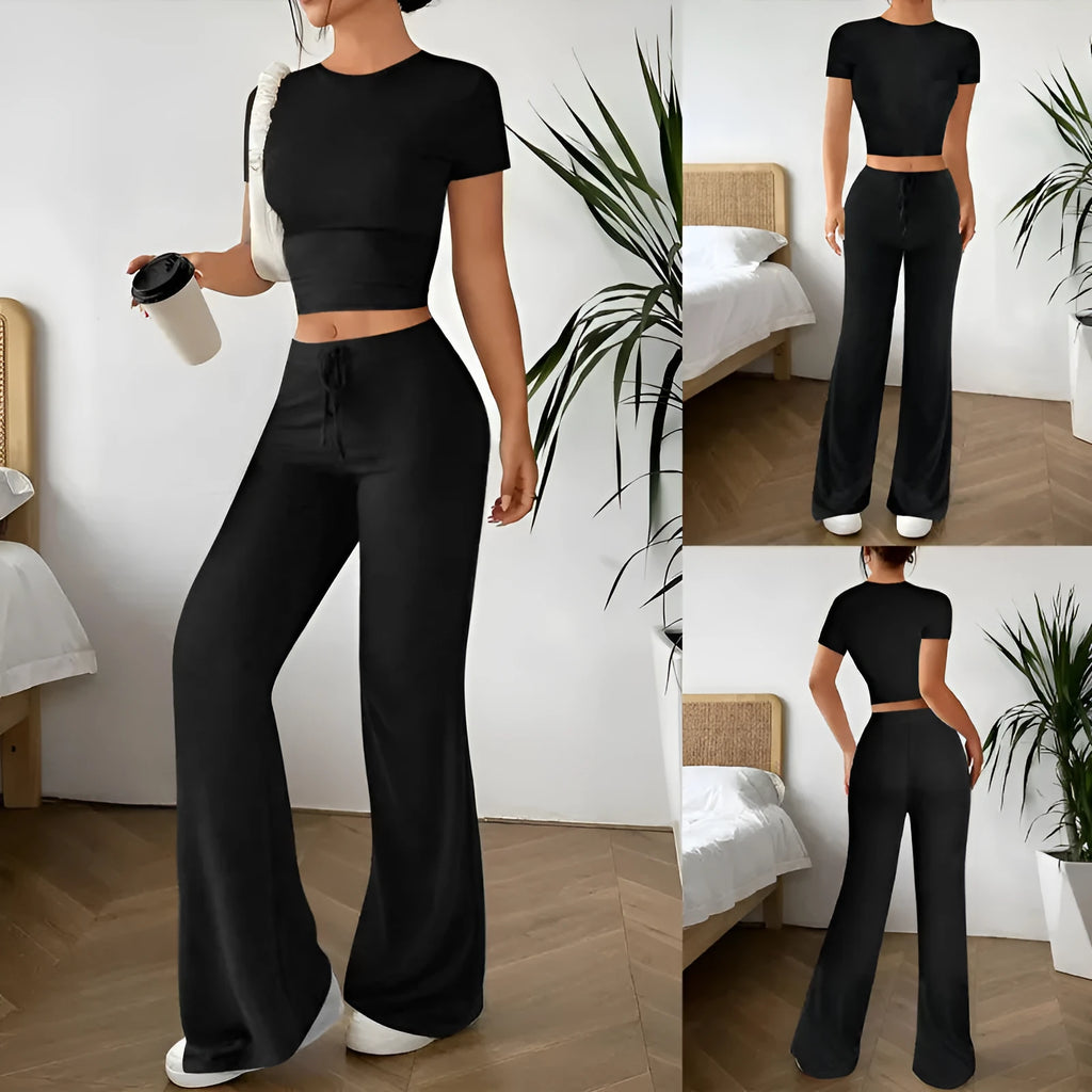 Black high-waist trousers and regular-sleeve T-shirt matching set for women laid flat.
