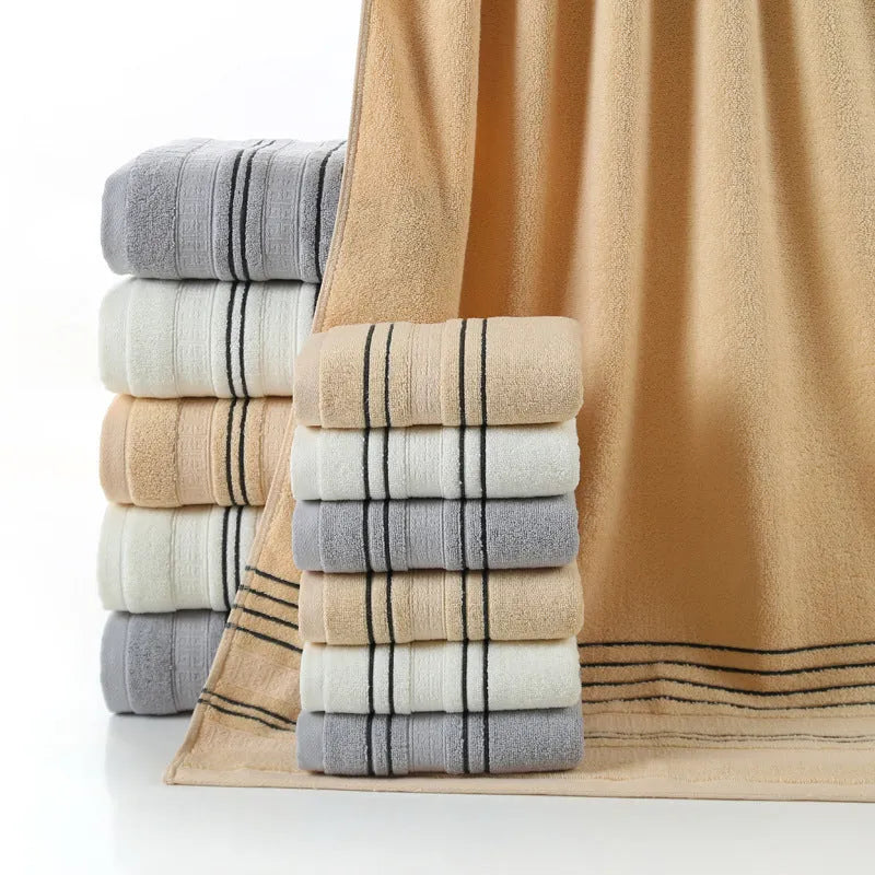 Cotton bath towel set showing hand towel and bath towel sizes in grey colour