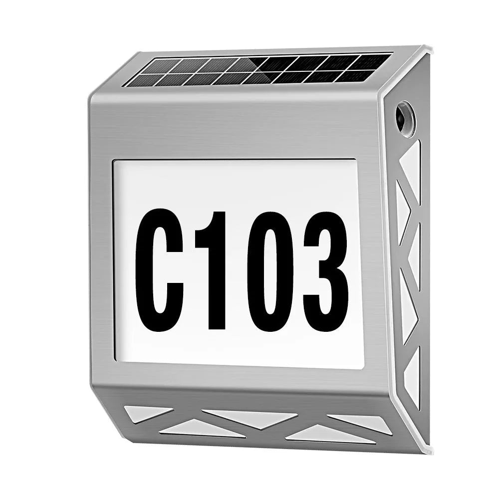 Black solar powered doorplate light with digital LED display showing house numbers
