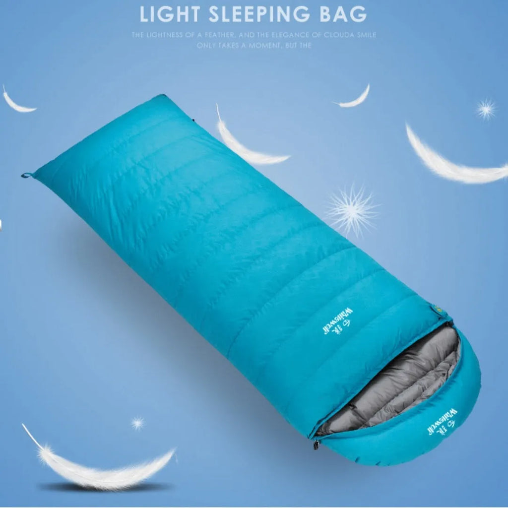 Black outdoor sleeping bag with envelope design, filled with white goose down for camping.
