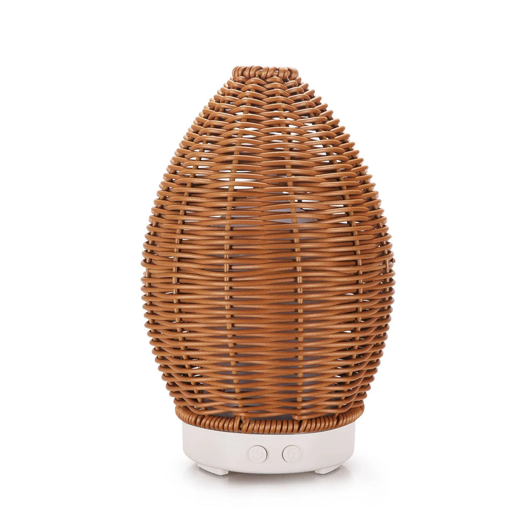 Hollow rattan aroma diffuser with light wood grain base showing 100ml capacity ultrasonic unit