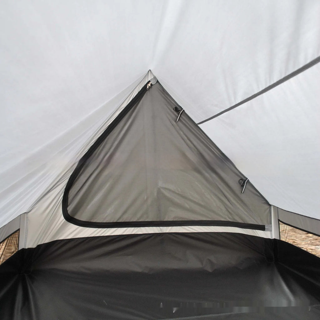 Brown A-line pole-free tent erected with hiking canes showing 2-3 person capacity and waterproof fabric construction