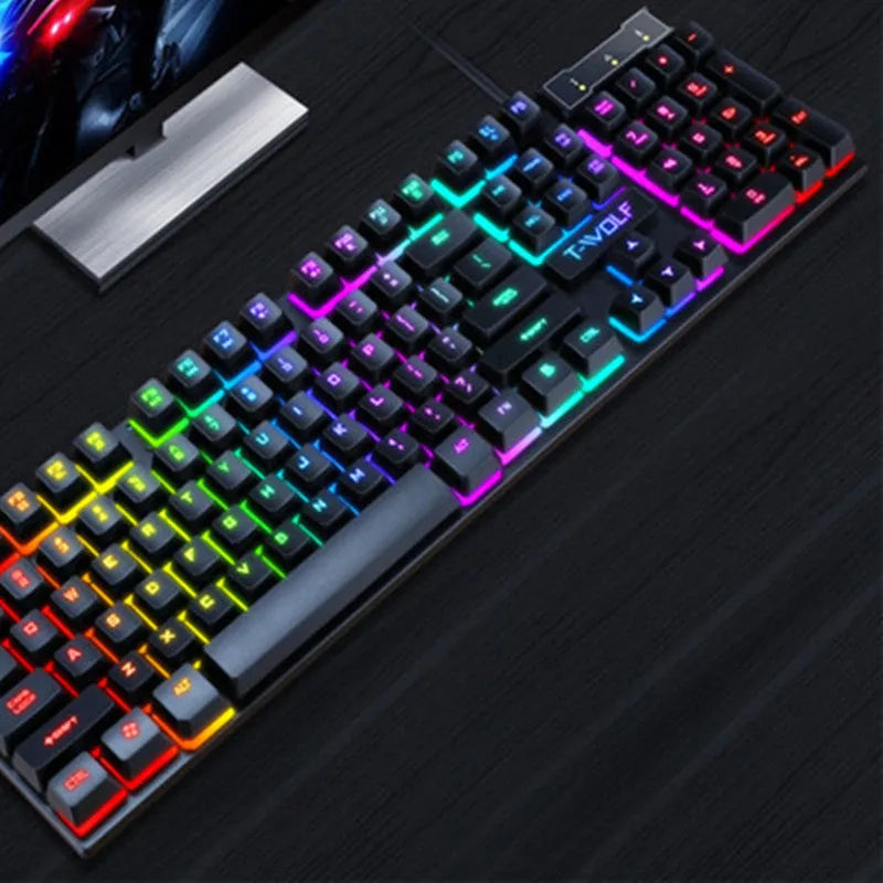 Gaming USB wired keyboard with floating keycaps and colourful backlight on a desk