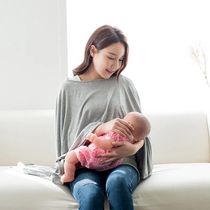 Nursing cover in black, grey or pink, soft breathable fabric, adjustable neck strap for breastfeeding privacy.