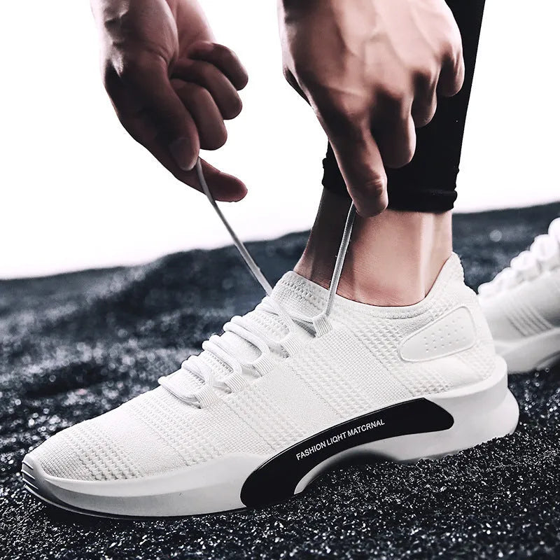 Men's breathable mesh casual sports shoes with front tie, low heel, round toe, in black, grey or white.