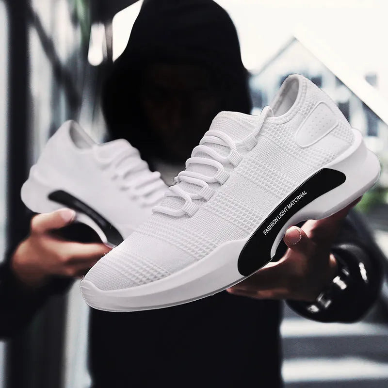 Men's breathable mesh casual sports shoes with front tie, low heel, round toe, in black, grey or white.