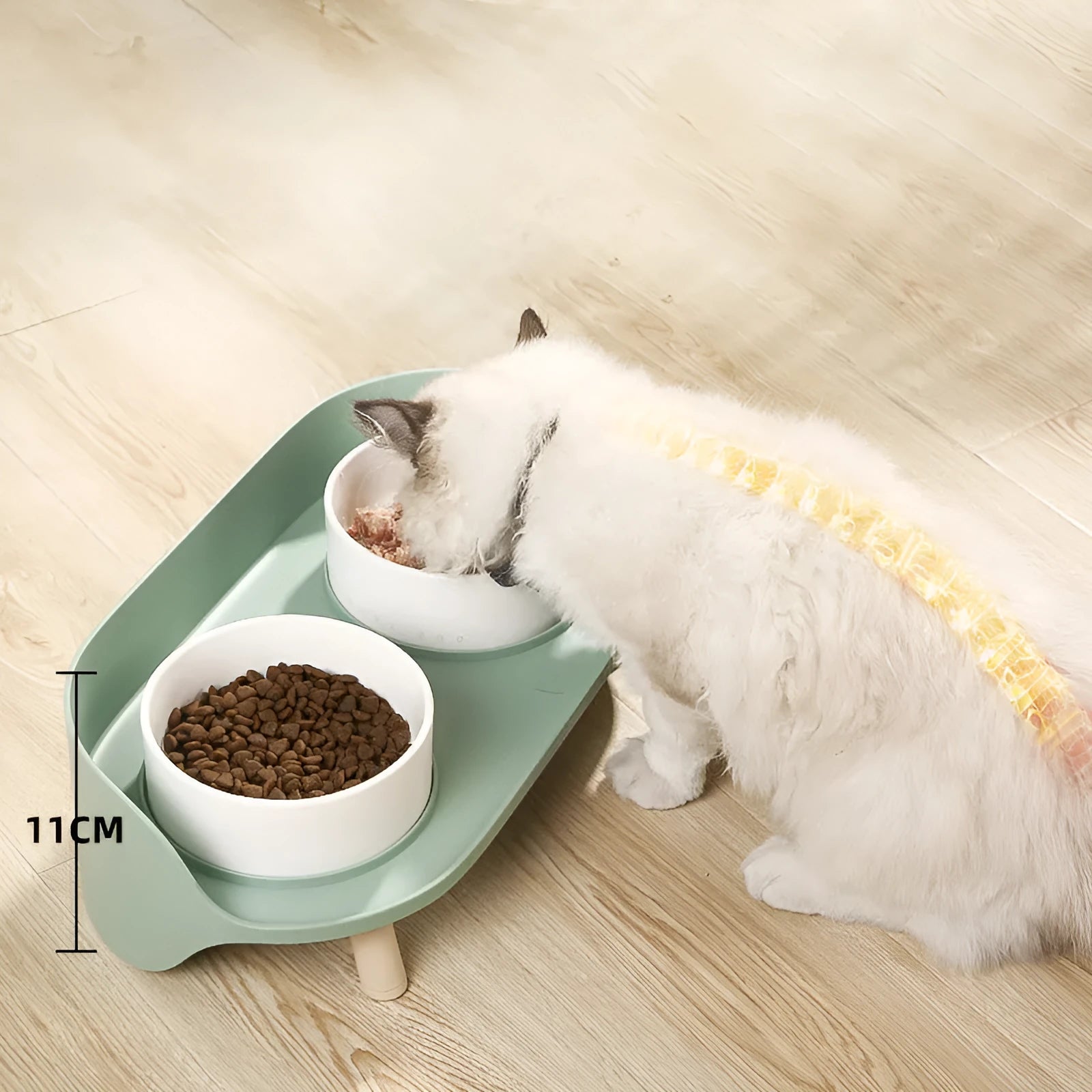 Green adjustable tilted pet feeder with two bowls for cats and dogs