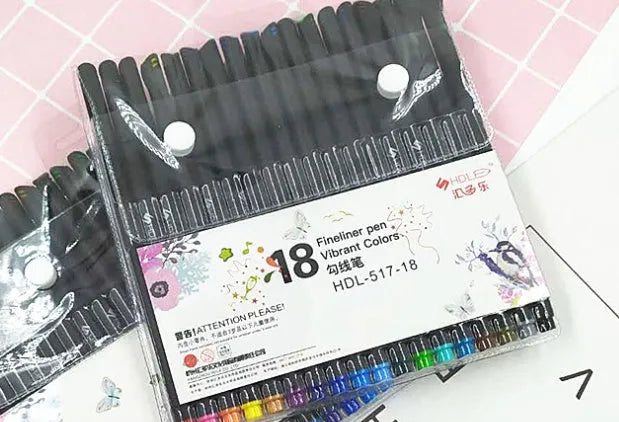 Set of watercolour pencils in 18 colours with plastic casing on white background
