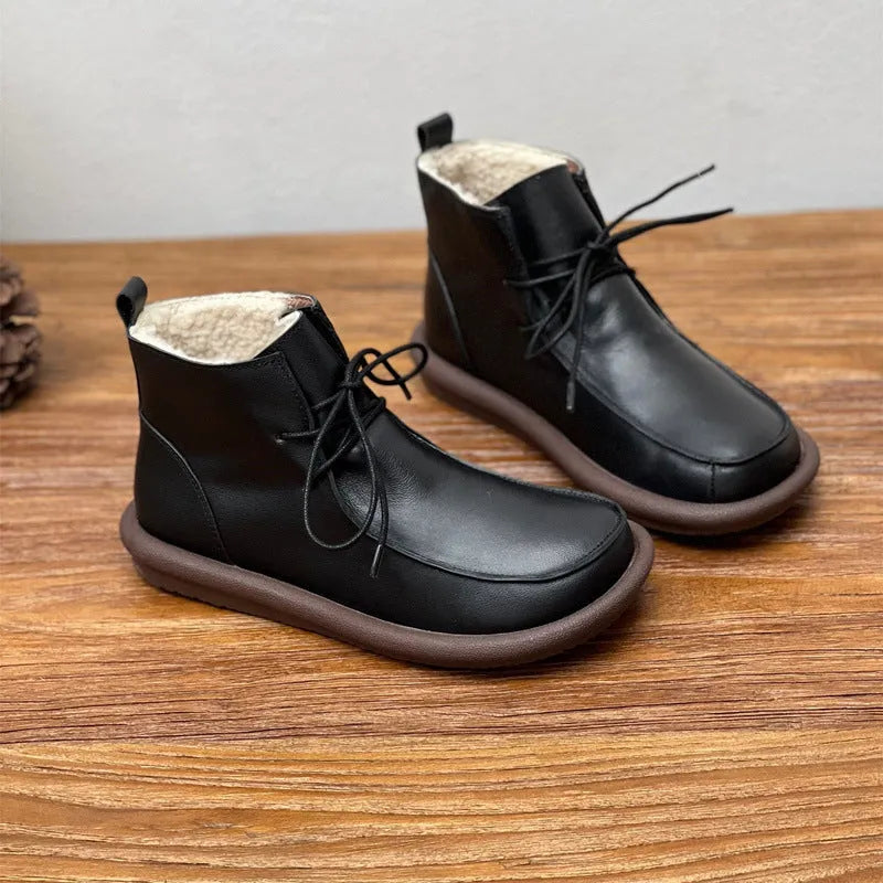 Women's cowhide boots with optional velvet lining, flat heel, round toe, and 9cm ankle sock in black and coffee colours