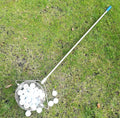Metallic 304 stainless steel golf ball picker on a green surface.
