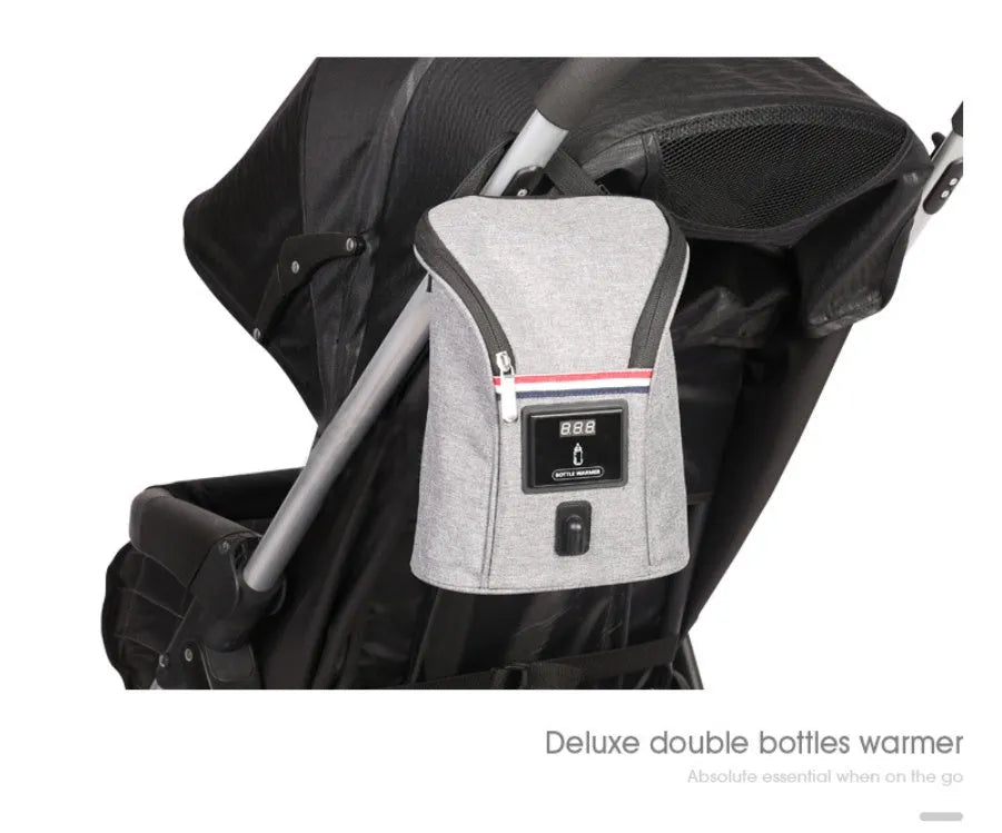 Grey Oxford cloth portable car USB baby bottle warmer with electronic display and car charger.