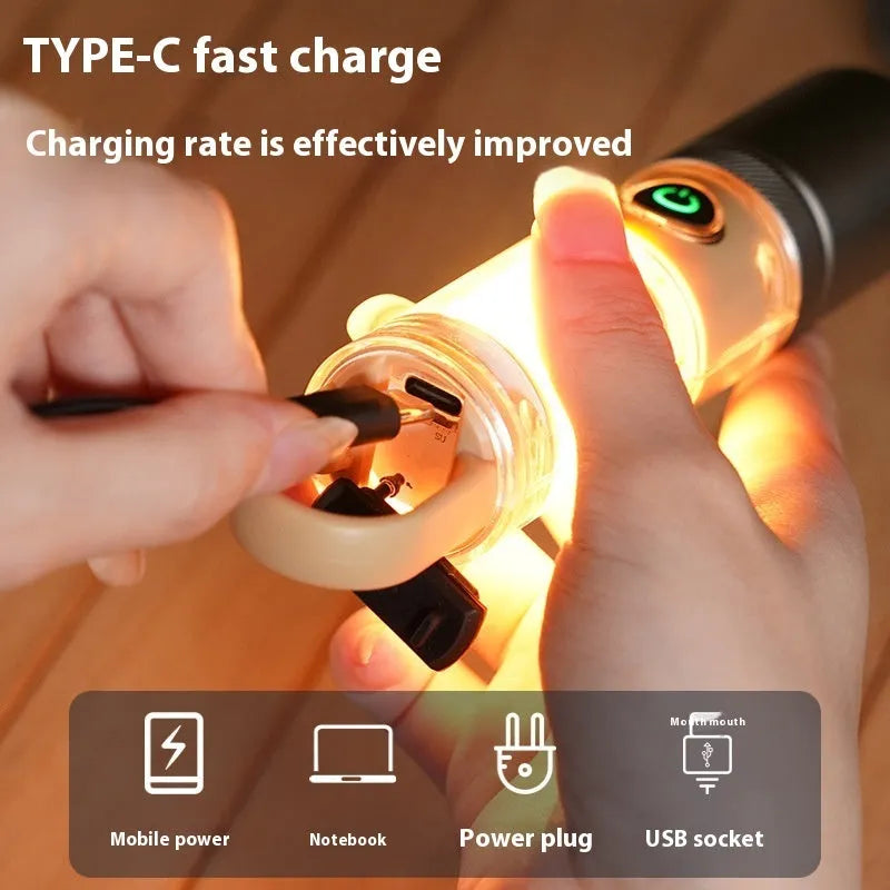 Orange 10W LED flashlight with dual light source, optical zoom, and USB charging cable