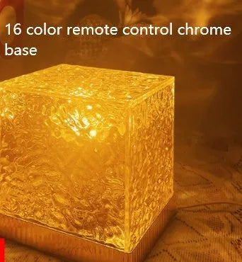 LED water ripple night light with USB cable and remote control creating rotating projection on wall