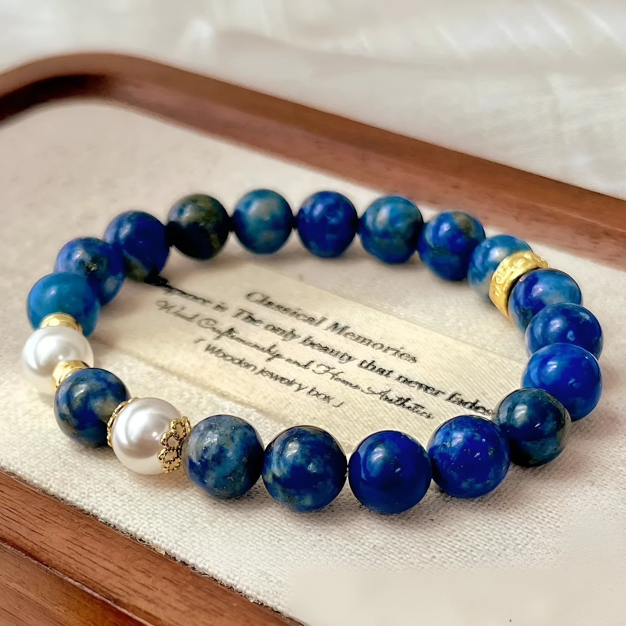 Chinese style retro lapis lazuli bracelet with natural green colour and gold stone decorative details