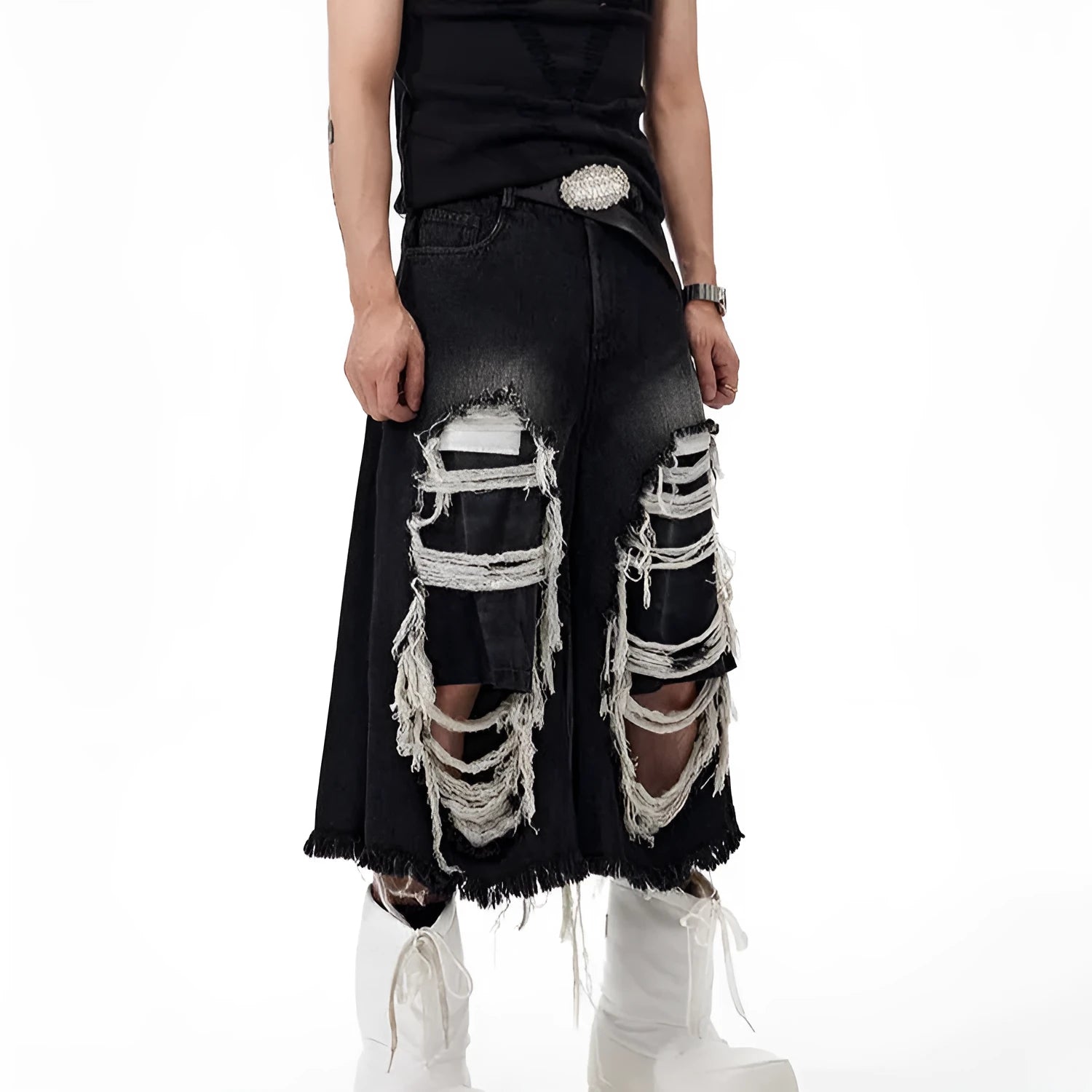 Black women's wide-leg cropped jeans with ripped patchwork details on cotton denim.