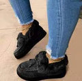 Cotton slipper shoes with a velvet lining, round toe, and textured rubber non-slip sole.