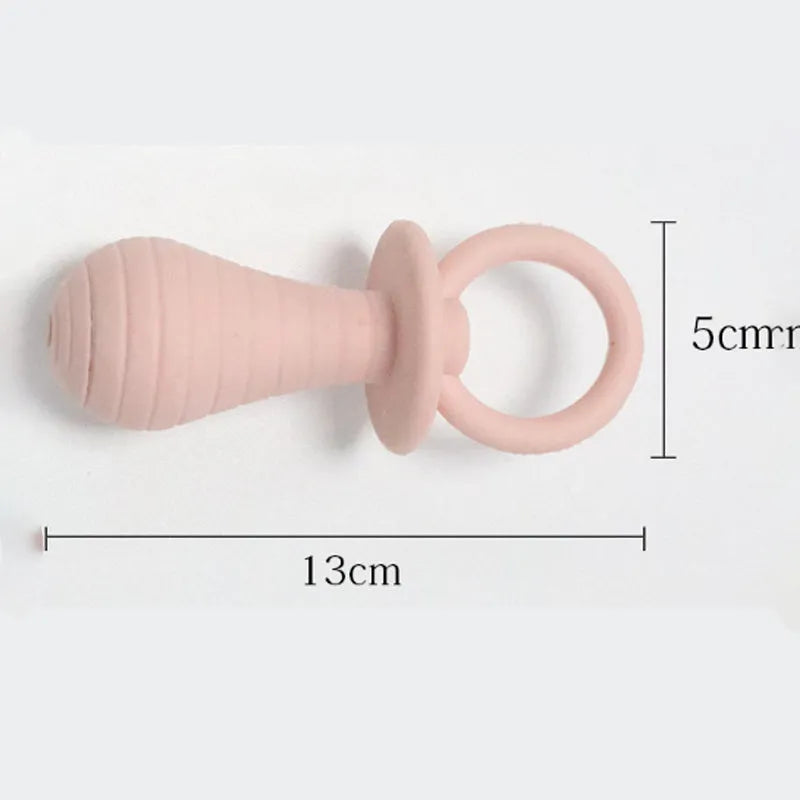 Set of four coloured TPR rubber pacifier chew toys for puppies and kittens on a white background.