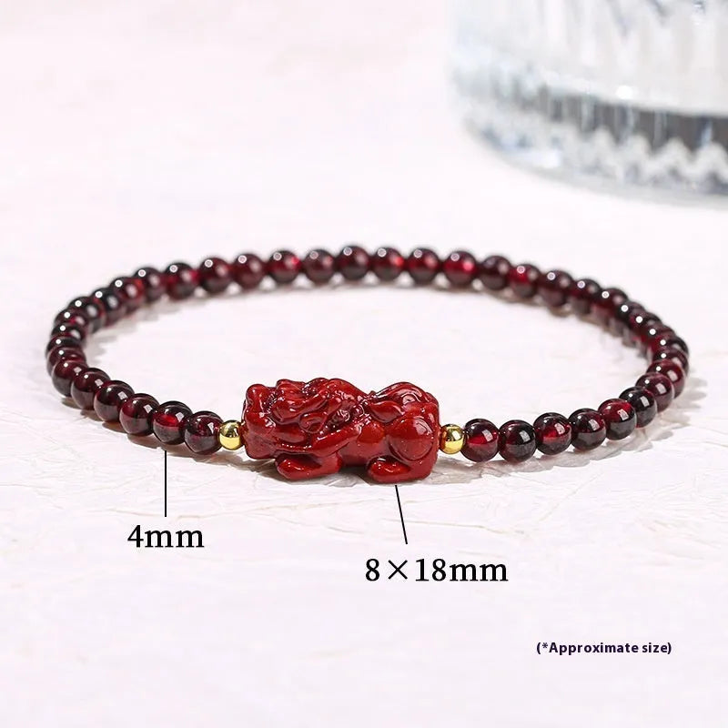 A square geometric bracelet for women made from natural Garnet and Strawberry Quartz with a carved Pixiu charm.