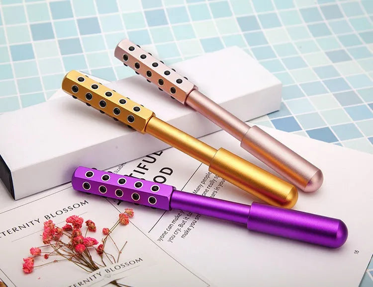 Purple germanium roller facial massager with 24 rollers for eye and facial massage