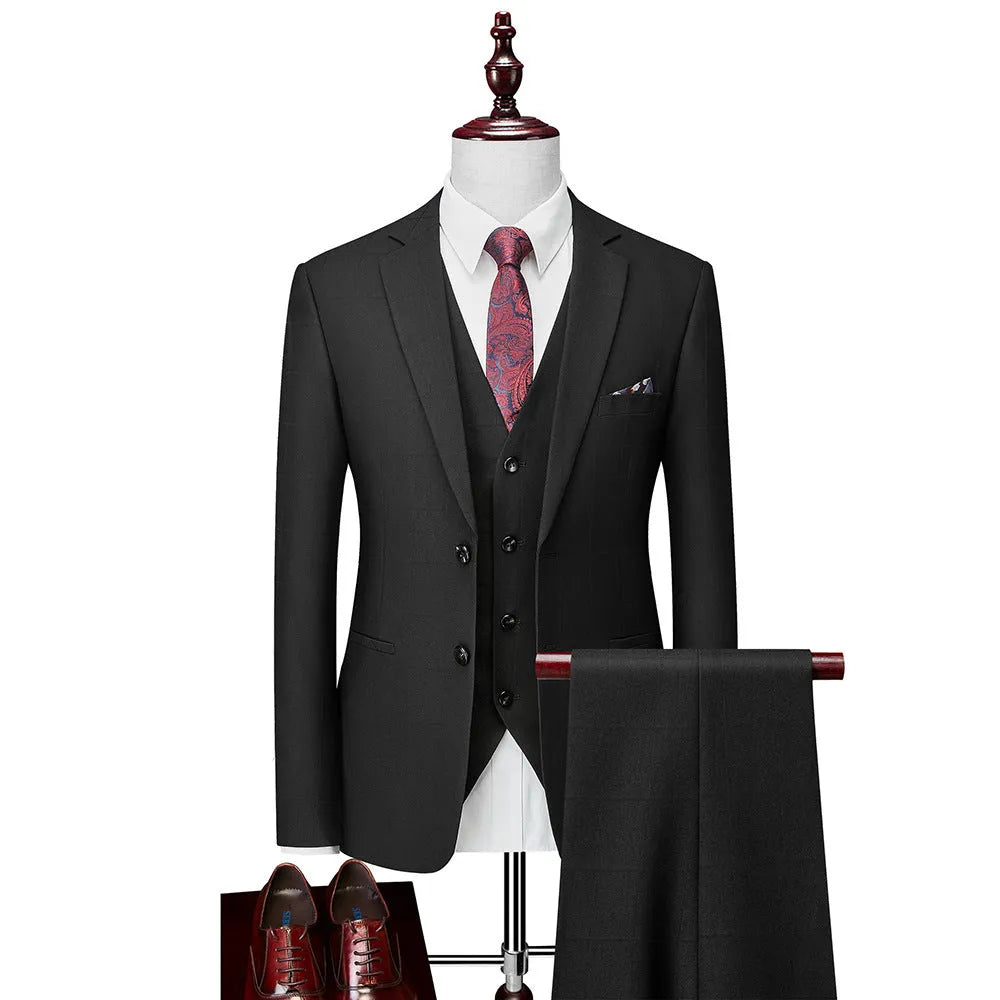 Men's slim fit plaid three-piece suit in navy blue with jacket, vest, and trousers