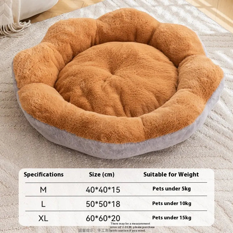 Soft plush round cat bed with a removable cover in a brown grey colour, shown on a floor.