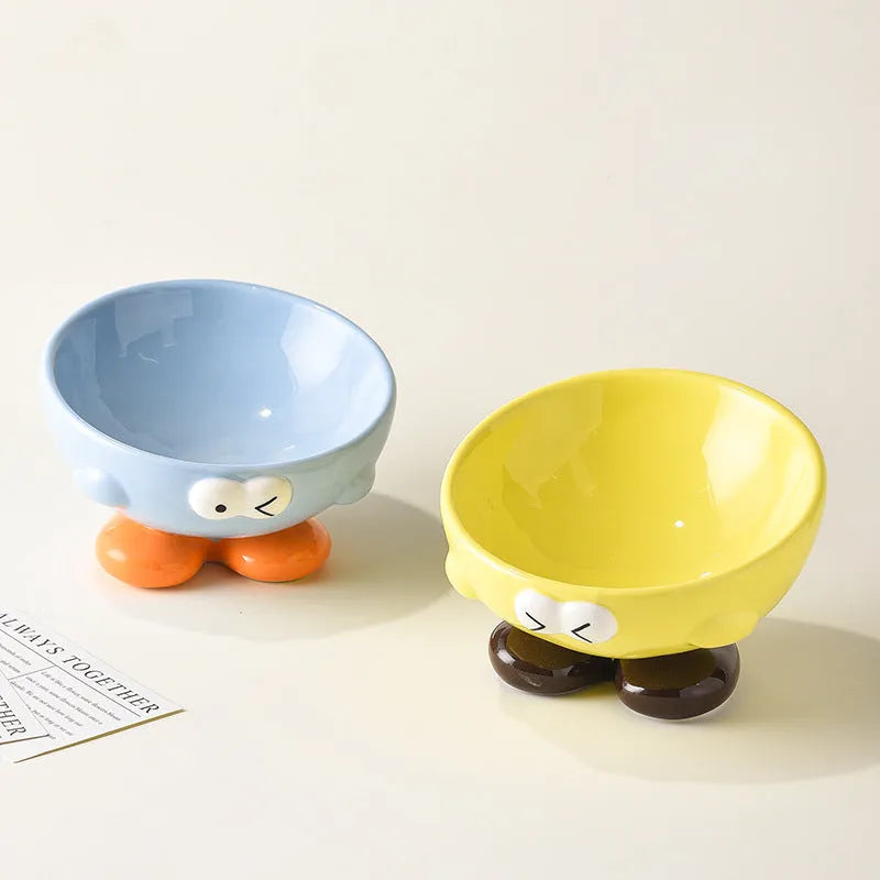 Ceramic slanted pet bowl in blue colour showing oblique design for neck support during feeding
