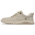 Men's brown leather sports shoes with suede finish and anti-skid plastic sole on concrete background