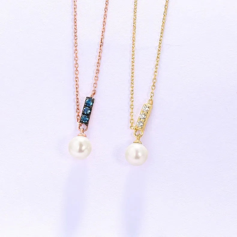 14K rose gold pearl necklace with London Blue stone, 4.5-5MM freshwater pearls, and 420mm adjustable chain.