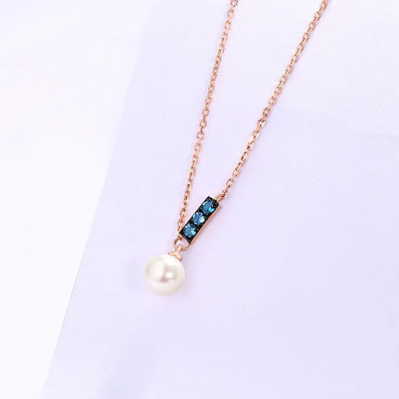 14K rose gold pearl necklace with London Blue stone, 4.5-5MM freshwater pearls, and 420mm adjustable chain.