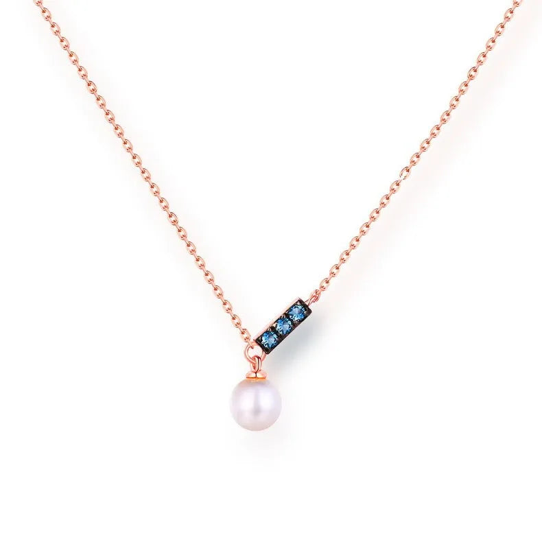 14K rose gold pearl necklace with London Blue stone, 4.5-5MM freshwater pearls, and 420mm adjustable chain.