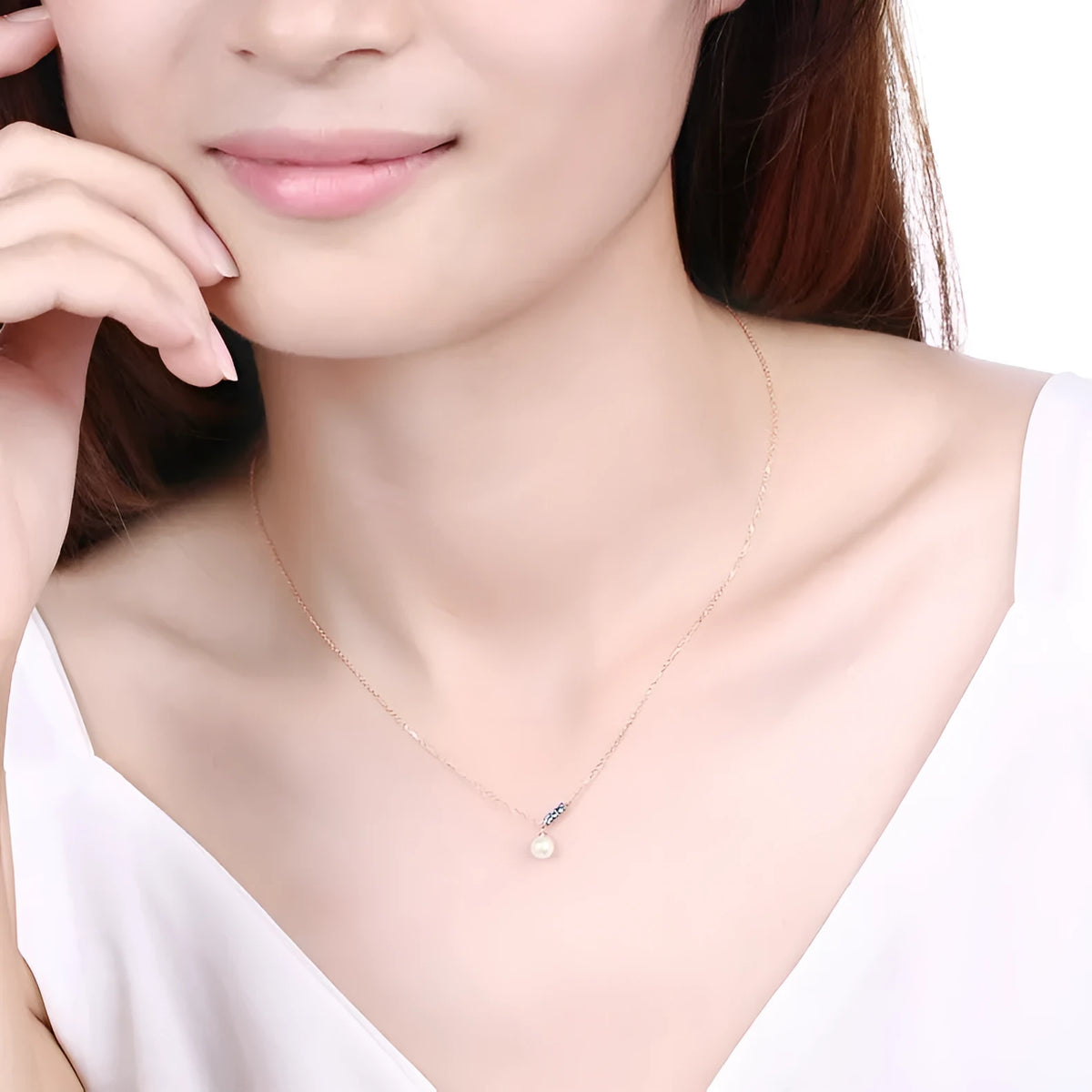 14K rose gold pearl necklace with London Blue stone, 4.5-5MM freshwater pearls, and 420mm adjustable chain.