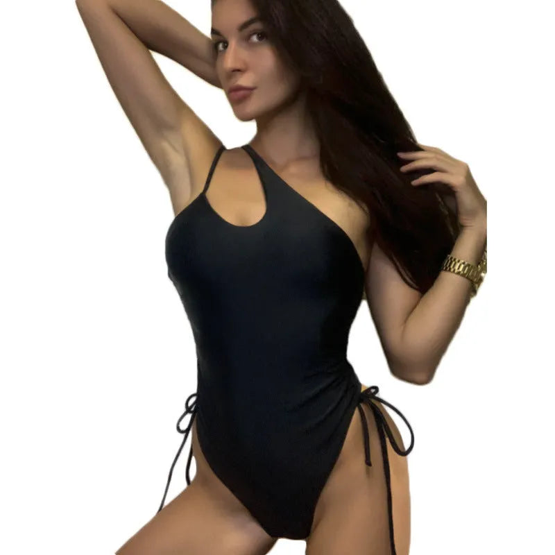 Black women's sleeveless dress with sloping shoulders and tight-fitting bodycon style