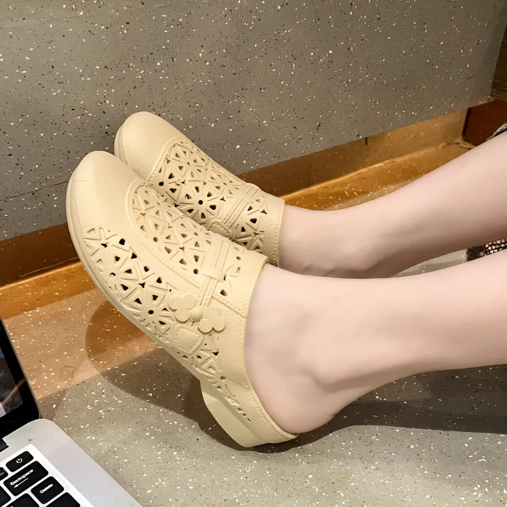 Flat toe box fairy style half slippers in apricot, black, and brown colours with hollow-out design.