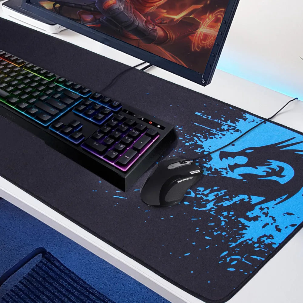 Non-slip mouse pad with textured surface and reinforced stitched edges on a desk
