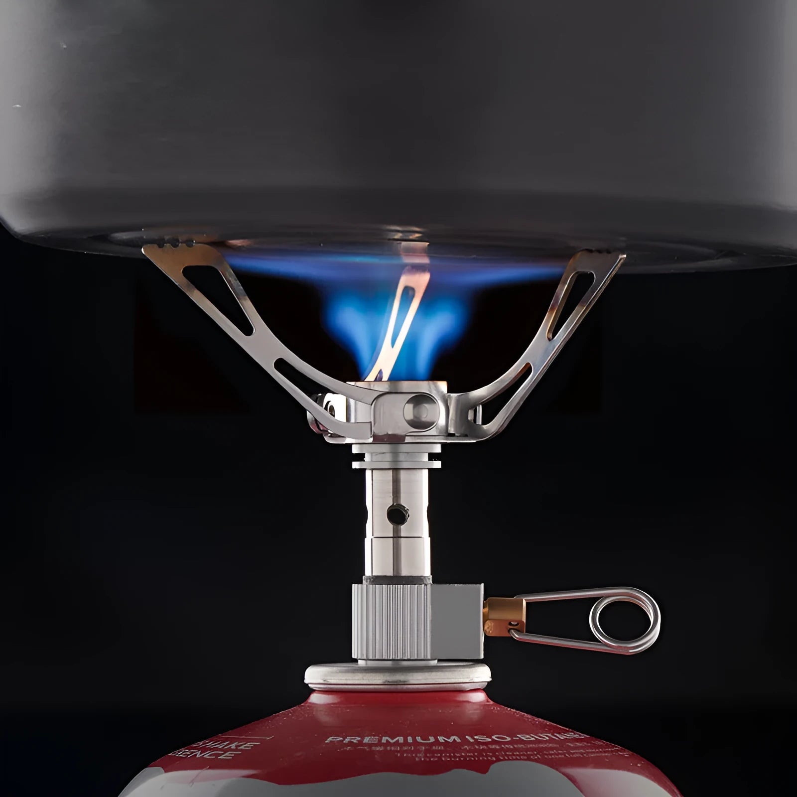 Portable folding mini camping stove made of stainless steel, copper, and aluminium with carry pouch