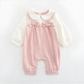 Pink embroidered cotton baby girl jumpsuit with long sleeves and single-breasted closure