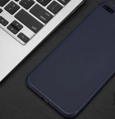 Flexible TPU and silicone mobile phone case for iPhone 7 in black, blue, red, or white.