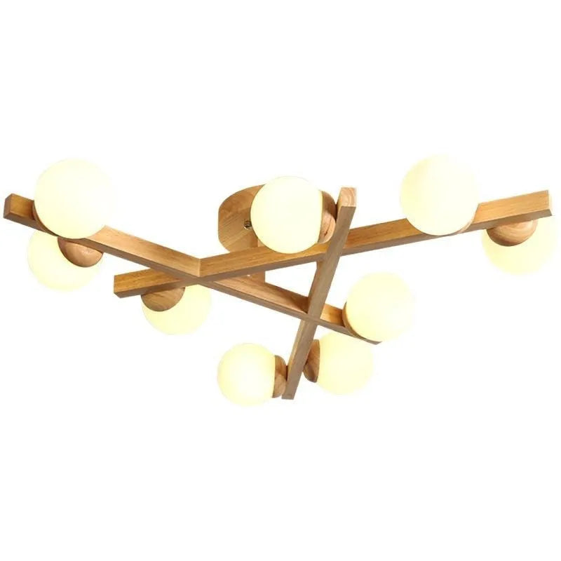 Wooden style modern Nordic ceiling light with three heads, installed in a living room.