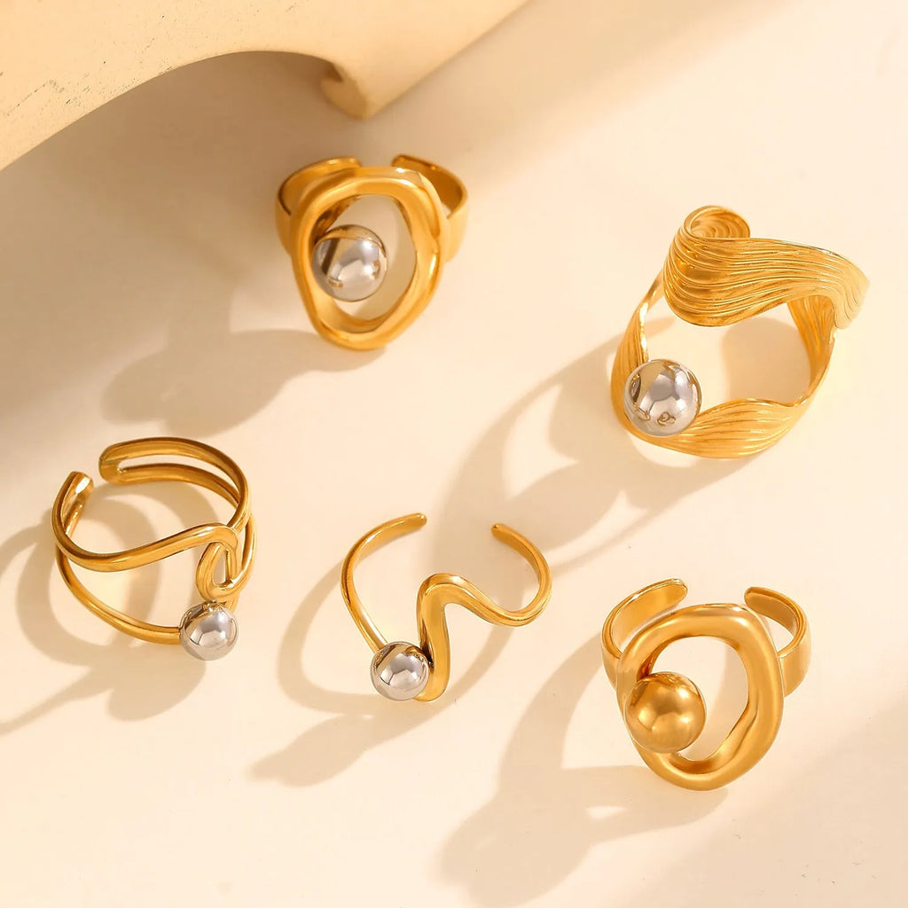 Stainless steel geometric open ring with 18K real gold finish and hollow line detail