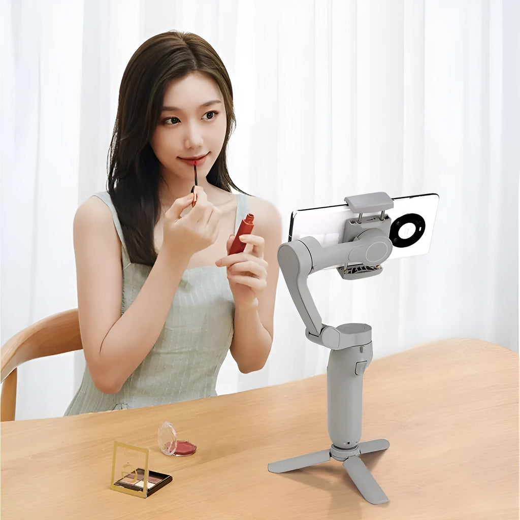 L7B PRO folding three-axis mobile phone gimbal stabilizer shown unfolded and folded