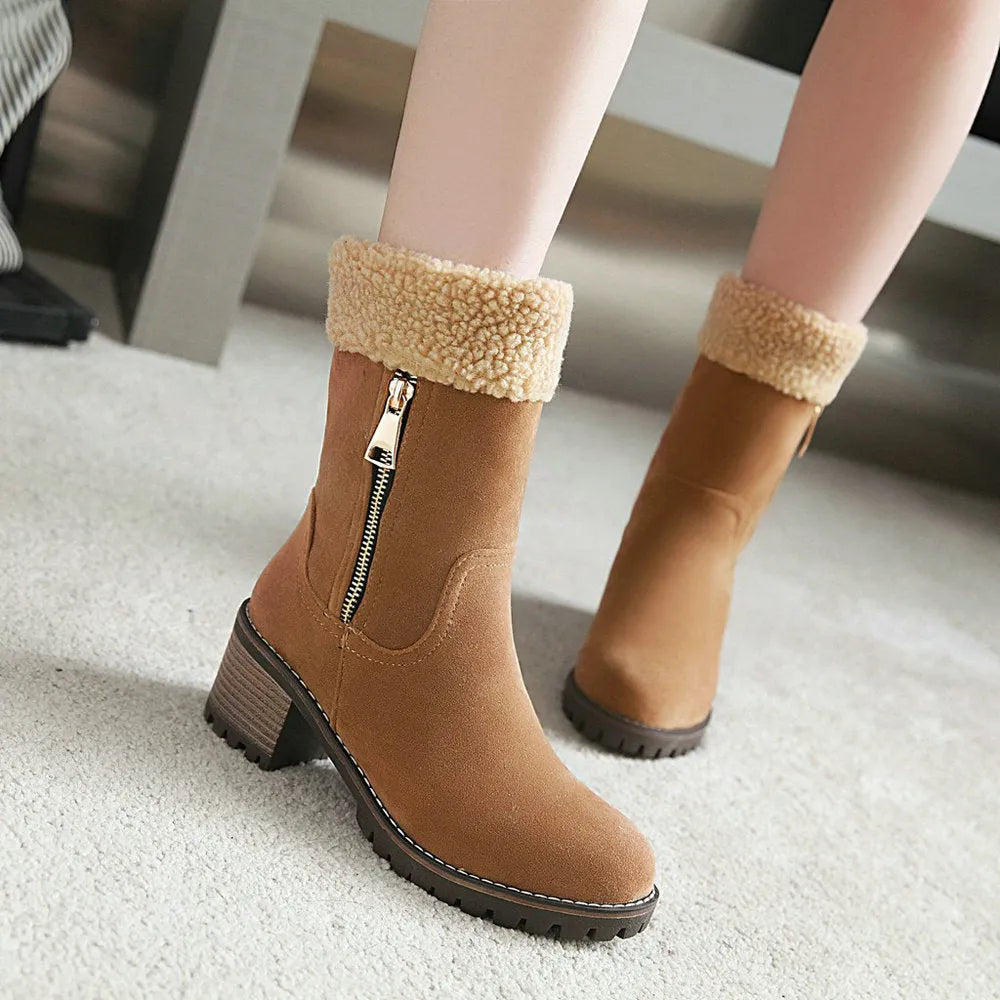 Pair of unisex winter snow boots with a rubber sole and plush lining in one of four available colours.
