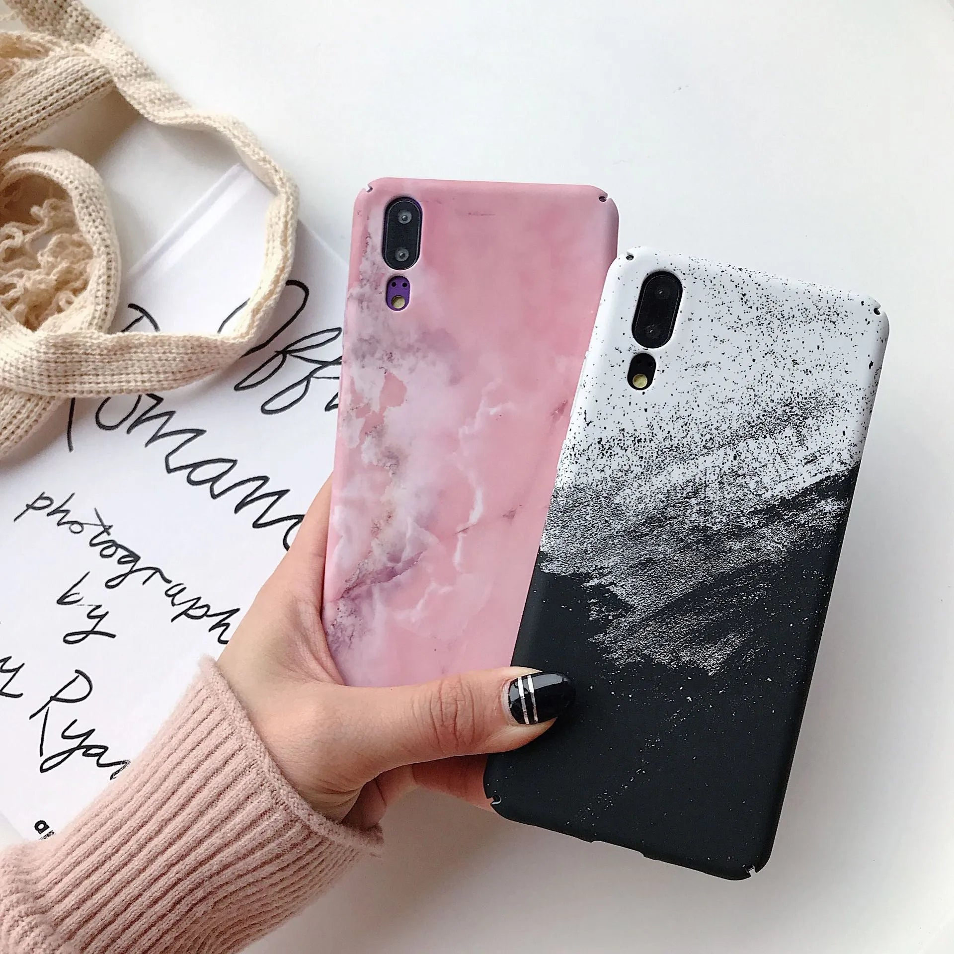 Painted black and pink mobile phone back cover cases for Huawei and Honor models.
