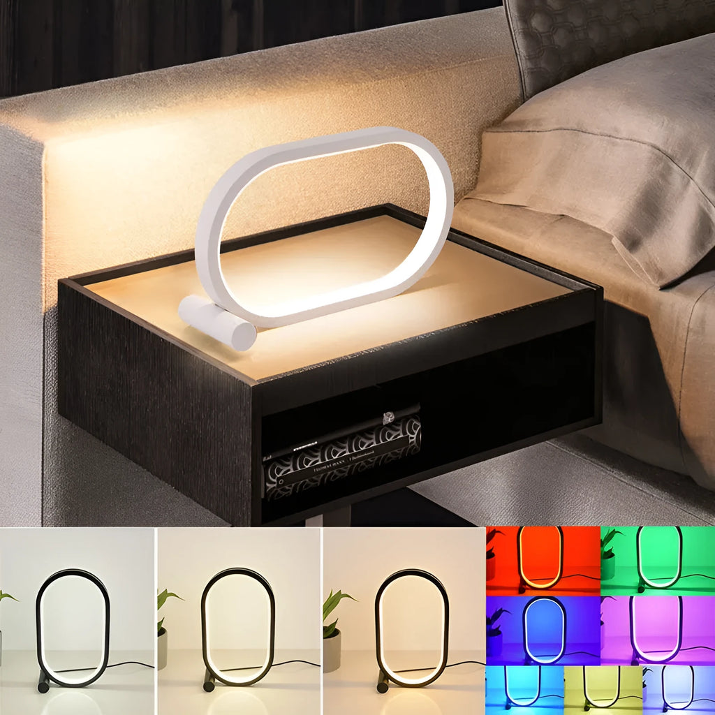 USB plug-in oval acrylic touch lamp with dimmable LED, metal body, on a bedside table