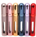 12ml aluminium travel perfume bottle with glass liner in silver finish, showing slim 115mm design.