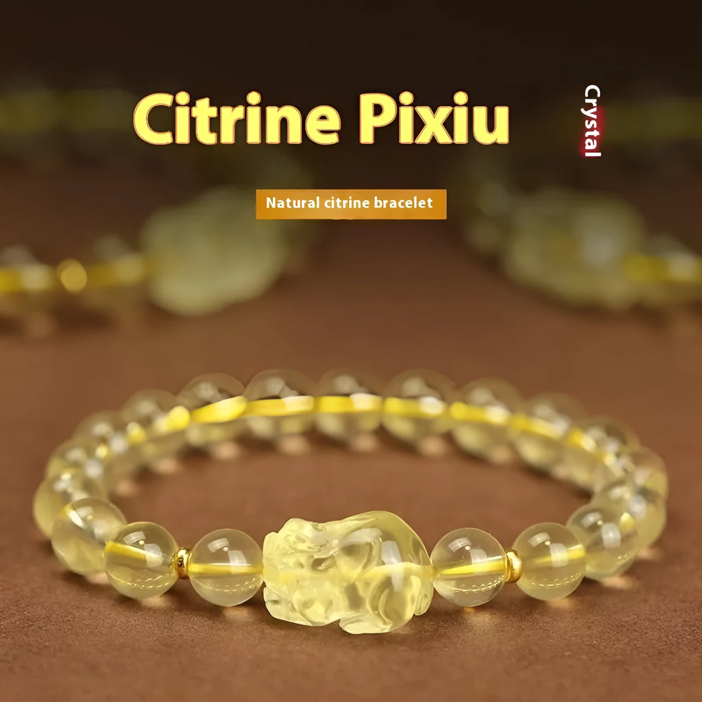 Yellow leather bracelet with an artificial crystal Citrine Pi Xiu charm in national Chinese style.