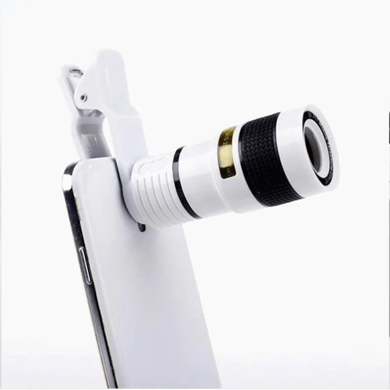 12X magnification phone telescope lens with attachment clip on a mobile phone.