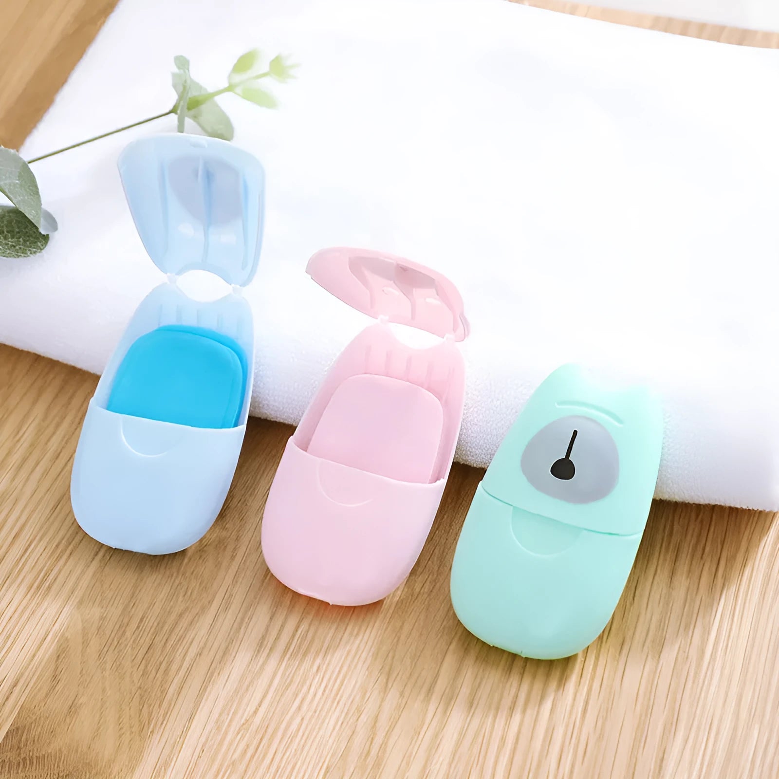 Pack of 50 biodegradable soap paper sheets in pink, blue, and green colours, 8x4.5cm size, for travel and outdoor hand cleaning