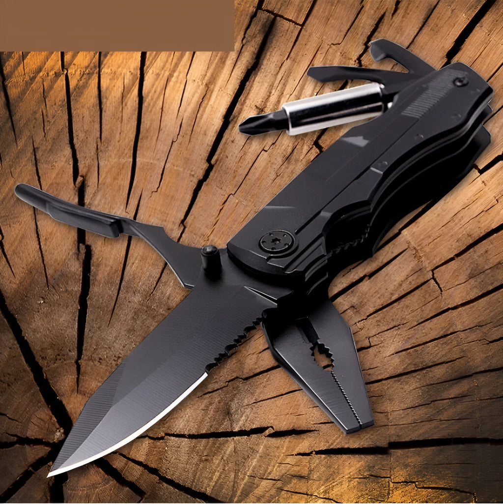 Black multi-purpose folding pliers tool with 7.5cm blade and aluminium handle on a flat surface