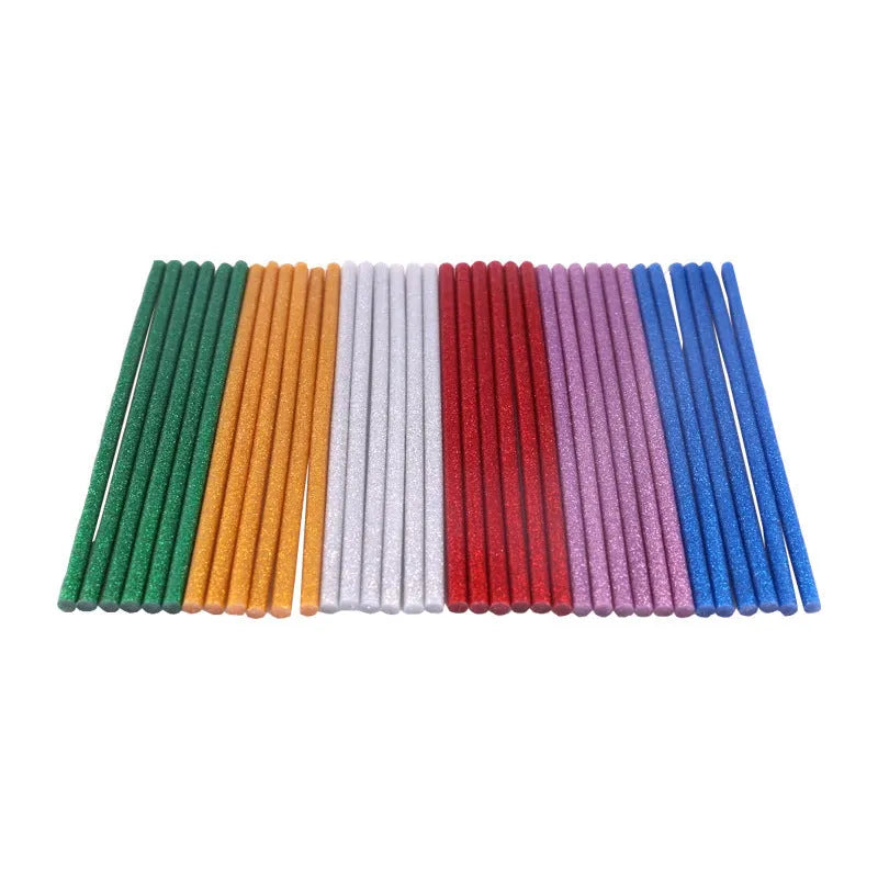Pack of 10 colorful hot melt glue sticks with gold leaf and luminous effects, 7.2mm and 11.2mm diameters, in various lengths.