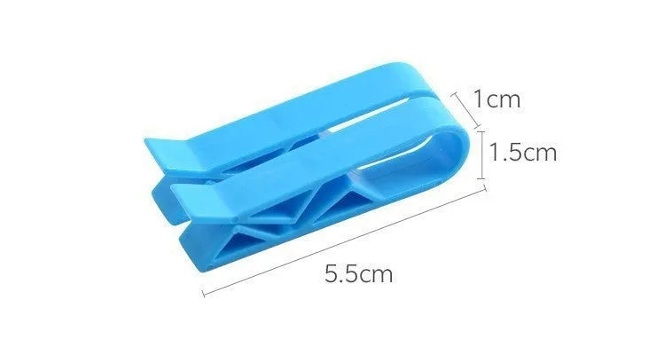 White PP plastic non-slip clip for fixing a bin liner to the side of a kitchen rubbish bin.